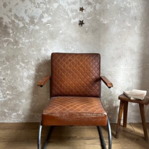 Fauteuil vintage cuire et metal