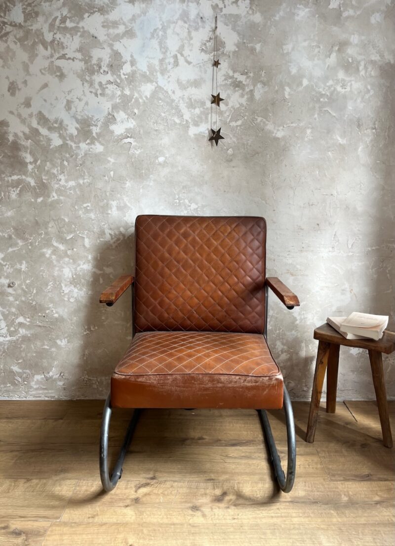 Fauteuil vintage cuire et metal