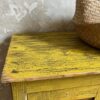 Petite armoire pharmacie à la magnifique patine jaune d'origine. À suspendre (sans système de fixation fourni) ou à poser au sol, pourquoi pas comme petite banquette d’appoint. La patine a été fixée et subtilement sublimée avec une cire. Je l’ai imaginée comme meuble à chaussures, mais libre à vous de lui donner l’usage qui vous plaira ! Dimensions : H 68 cm x L 68 cm x P 39 cm